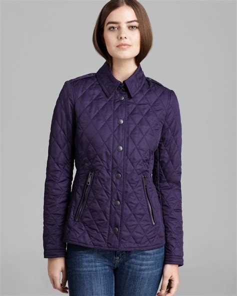 dark purple burberry polyester jacket.